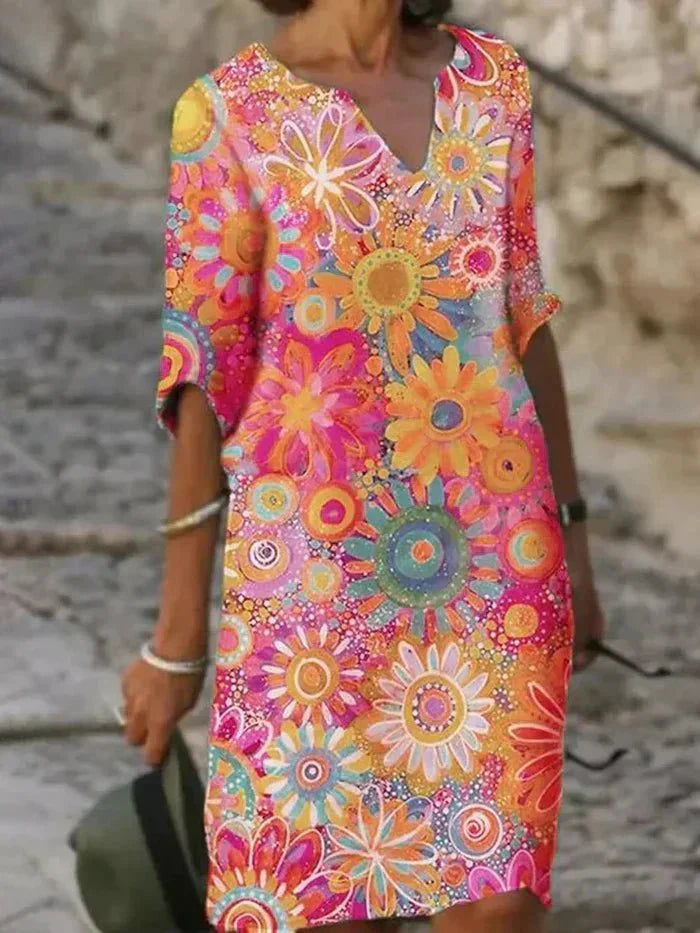 Nira | Livlig Blommig Midiklänning