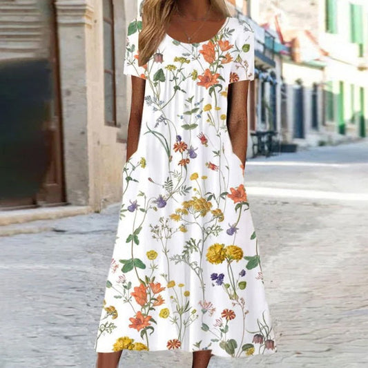 Ella | Bohemisk Blommig Klänning med Magdeckning