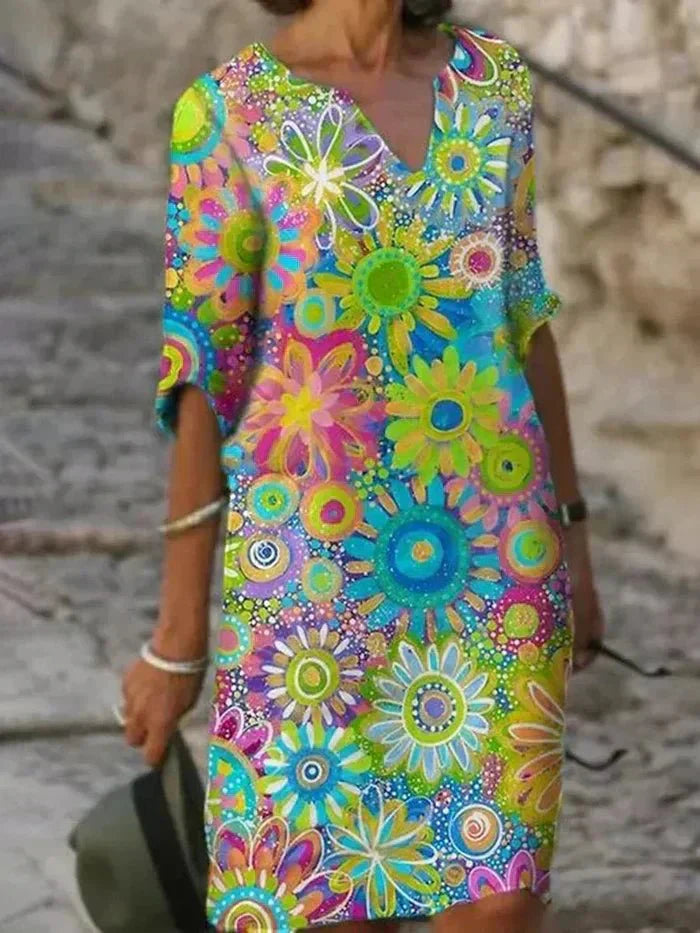 Nira | Livlig Blommig Midiklänning